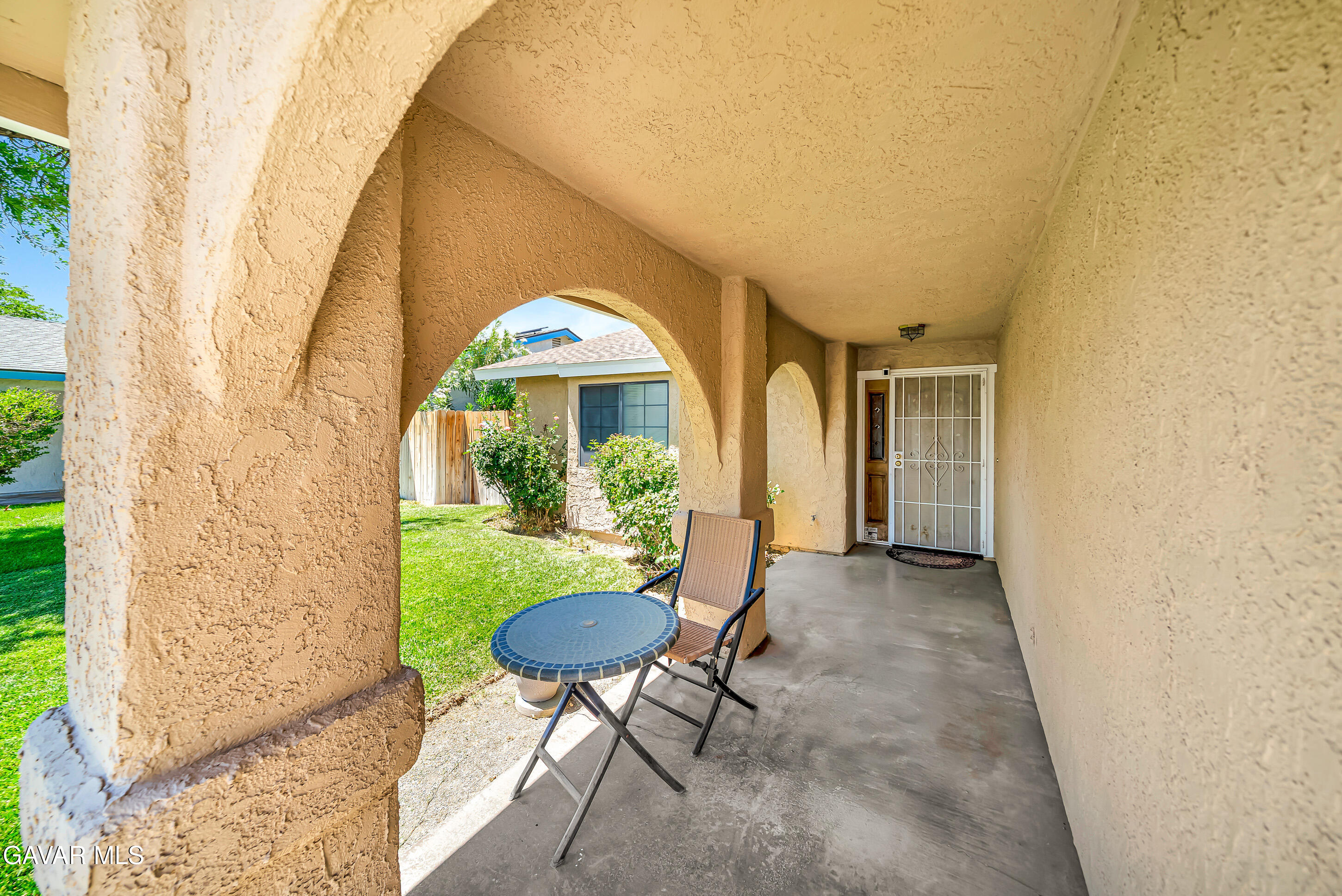 729 North Sunland Drive Ridgecrest, CA 93555 - Photo 5 of 52 a front view of a house with a yard