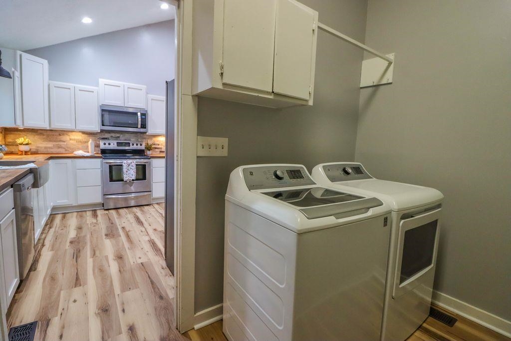 205 Charles Martin Road Ripley, TN 38063 - Photo 15 of 34 a kitchen that has a sink and a stove in it