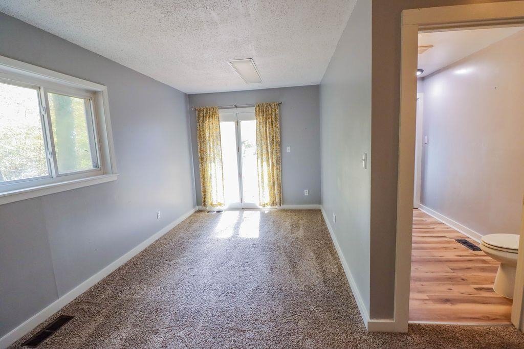 205 Charles Martin Road Ripley, TN 38063 - Photo 20 of 34 an empty room with windows and closet