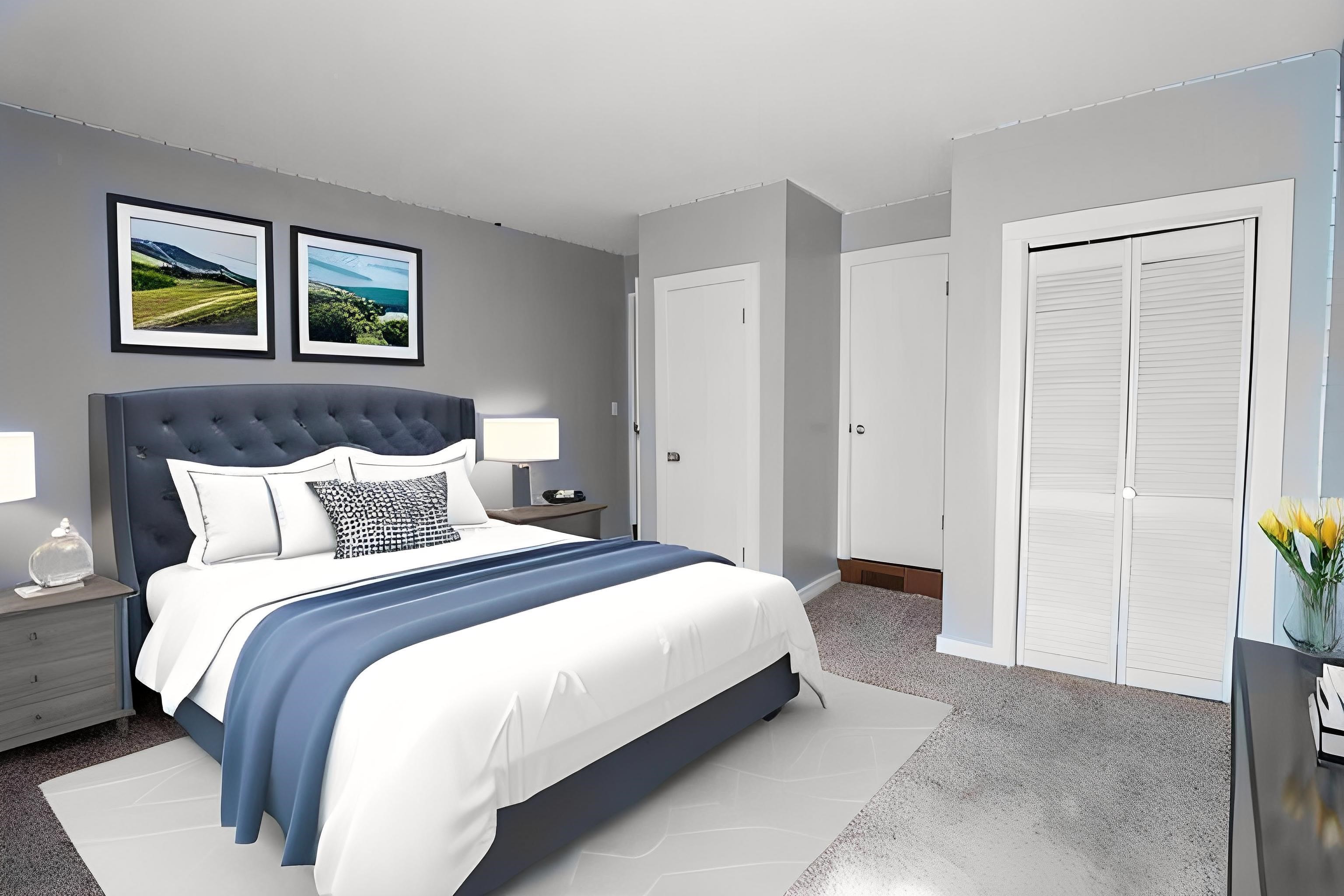 205 Charles Martin Road Ripley, TN 38063 - Photo 26 of 34 a bedroom with bed and painting on the wall