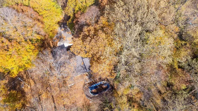 a living room with fireplace furniture and a flat screen tv