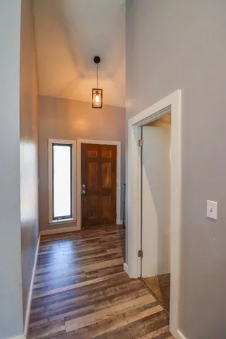 a kitchen that has a sink and a stove in it
