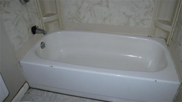 46 Breakneck Road Sturbridge, MA 01566 - Photo 12 of 15 a close up of a bathtub in a bathroom