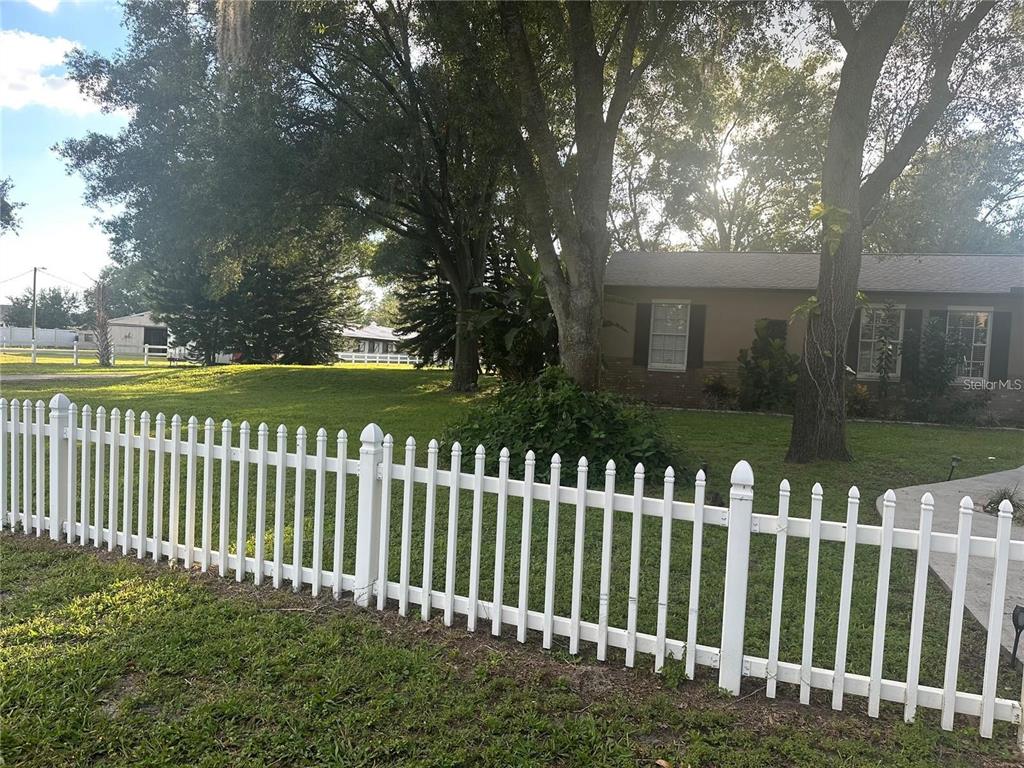 10520 Henderson Road Tampa, FL 33625 - Photo 2 of 9 a view of a wooden fence