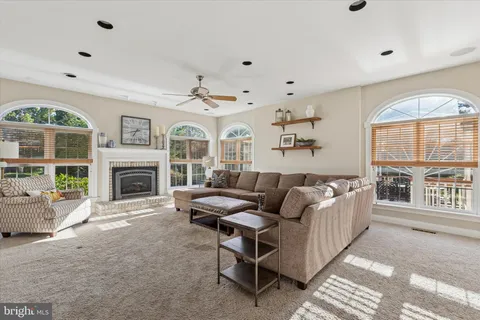 a room with furniture and a book shelf