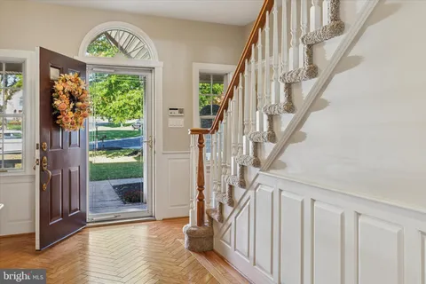 a view of entryway livingroom and hall
