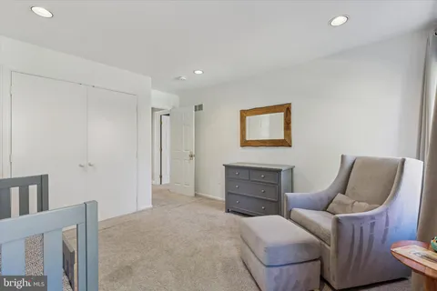 a bathroom with a sink toilet and vanity