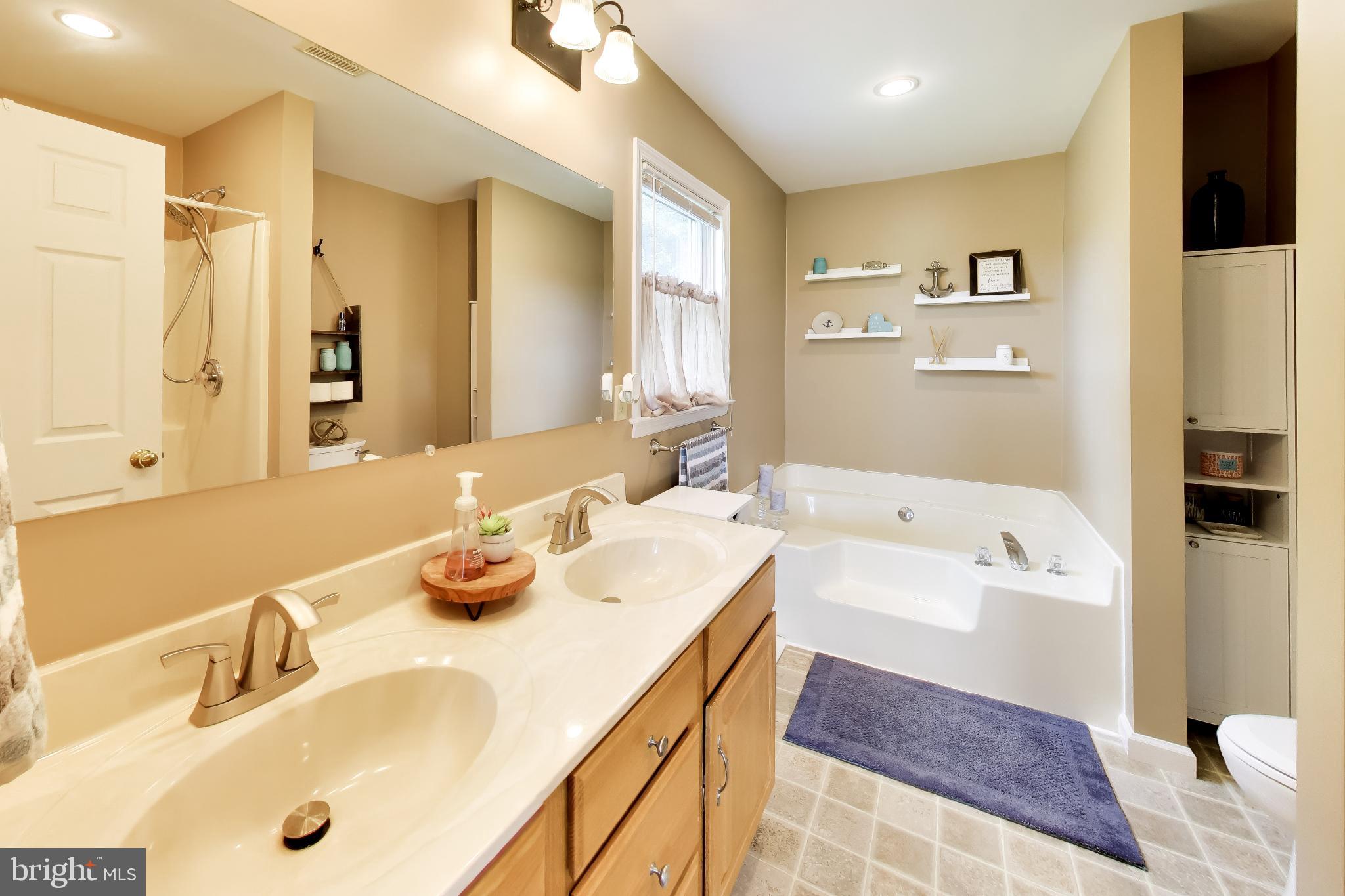 12205 Warner Road Keymar, MD 21757 - Photo 28 of 66 Serene bathroom retreat with modern touches.