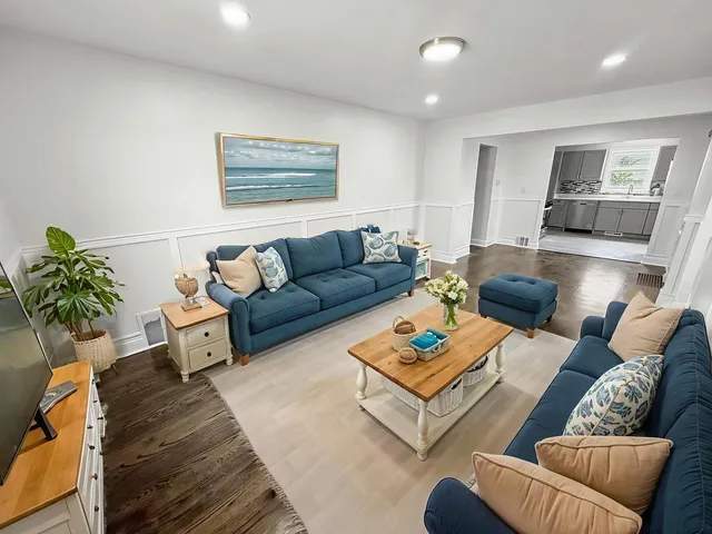 a living room with furniture and a couch