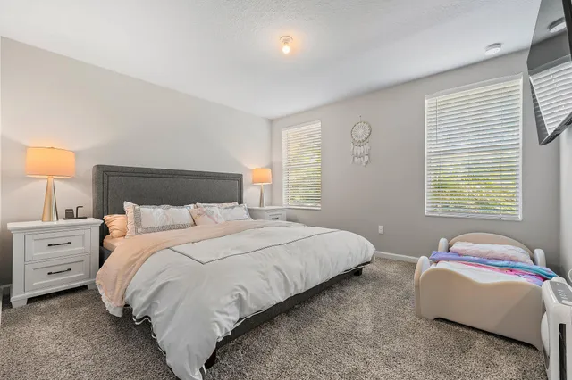 a bathroom with a sink double vanity and a mirror