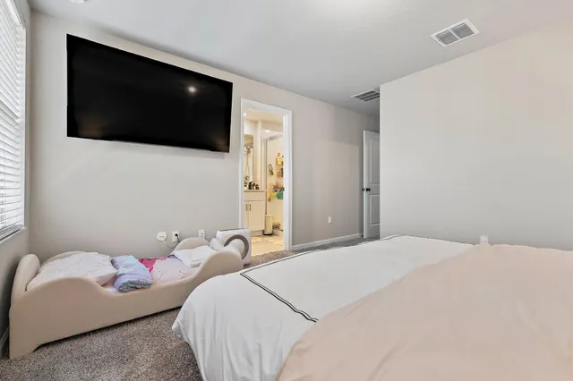 a bathroom with a sink and mirror
