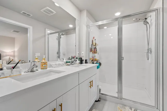 a view of a livingroom with workspace and a couch