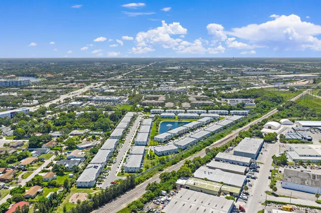 a aerial view of a house with a garden and plants