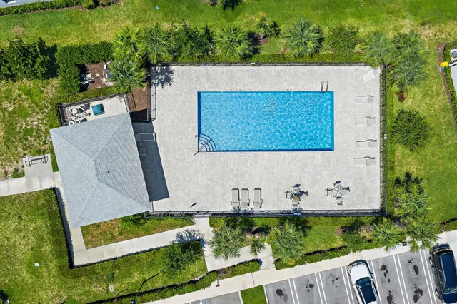 an aerial view of a house with a garden