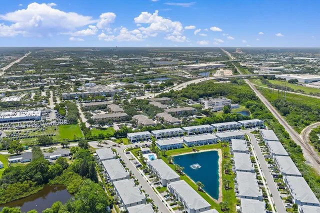an aerial view of a house with a garden
