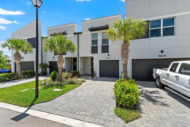 a view of balcony with furniture