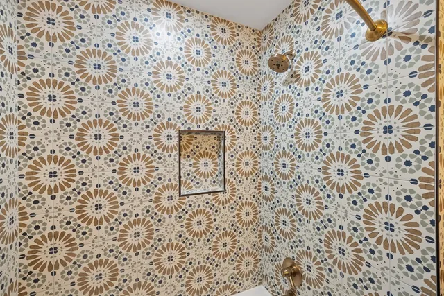 a bathroom with a shower curtain
