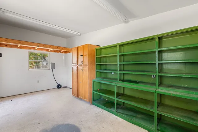 a view of empty room with empty room and window