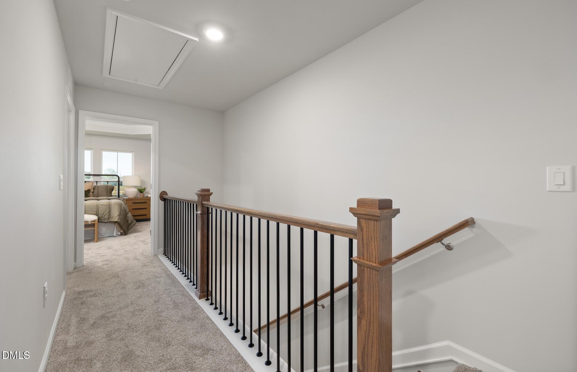 2810 Rodeo Court Fuquay-Varina, NC 27526 - Photo 19 of 30 a view of a hallway to a livingroom and a livingroom with furniture