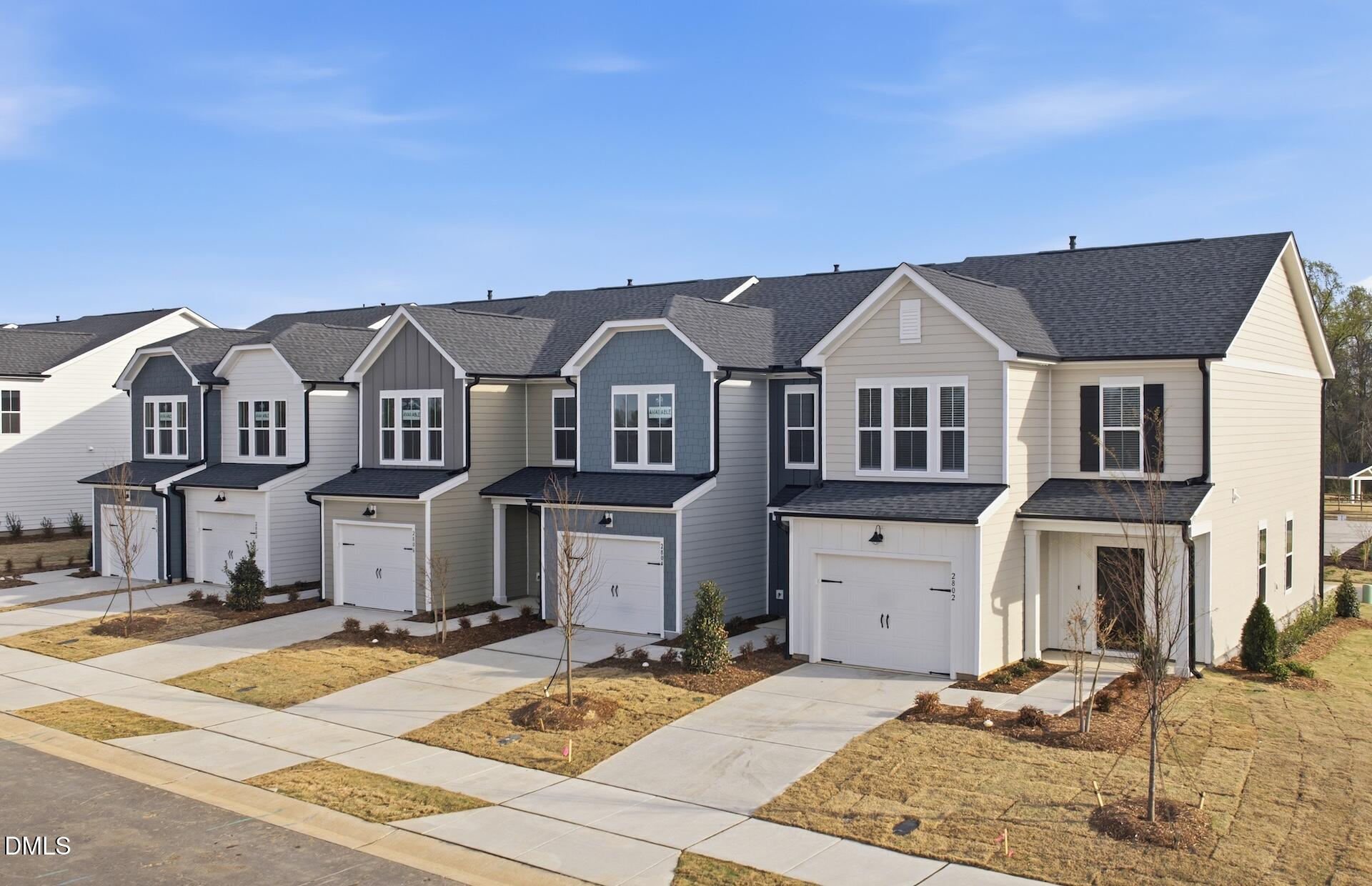 2810 Rodeo Court Fuquay-Varina, NC 27526 - Photo 24 of 30 a front view of a house with a yard
