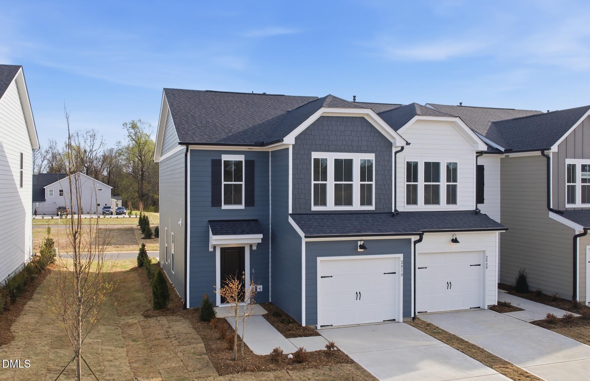 2810 Rodeo Court Fuquay-Varina, NC 27526 - Photo 3 of 30 a front view of a house with a yard