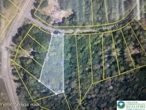 a view of outdoor space with seating area and trees