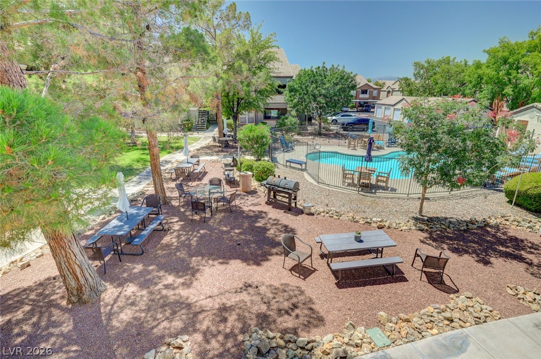 555 East Silverado Ranch Boulevard, Unit 2124 Las Vegas, NV 89183 - Photo 35 of 47 Relax poolside or gather for outdoor dining in this inviting community space.