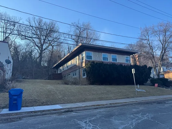 a view of a house with a pathway