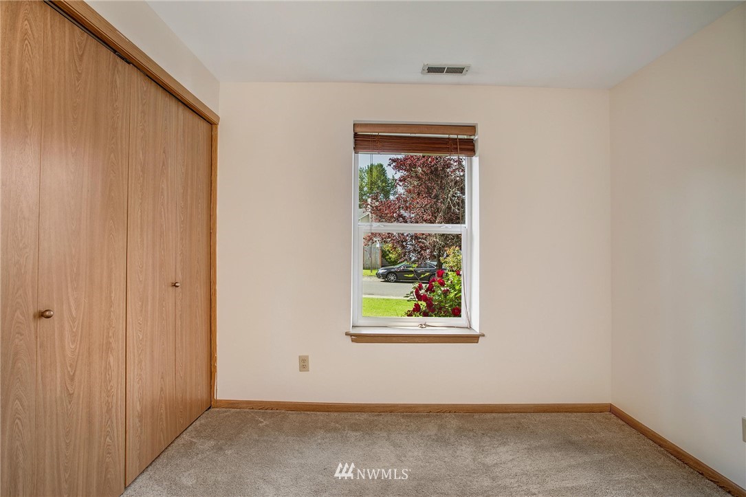 11206 Southeast 268th Street Kent, WA 98030 - Photo 22 of 23 an empty room with window
