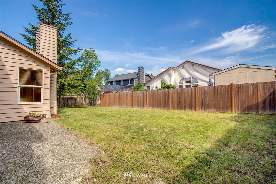 11206 Southeast 268th Street Kent, WA 98030 - Photo 5 of 23 a view of a backyard