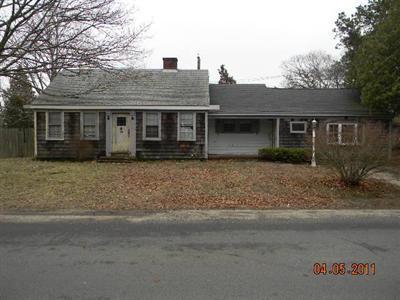 78 Lewis Road Hyannis, MA 02601 - Photo 1 of 13 front view of a house with a yard