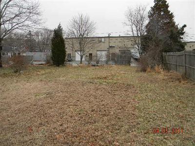 78 Lewis Road Hyannis, MA 02601 - Photo 2 of 13 a view of a barn in the middle of a yard