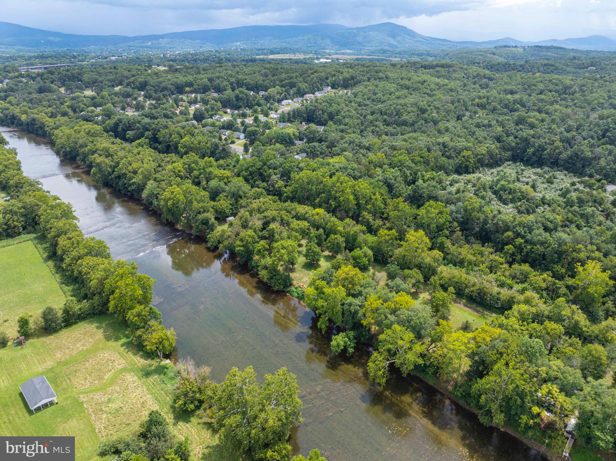 22 Burma Road Front Royal, VA 22630 - Photo 16 of 20 Serene river winding through lush greenery.