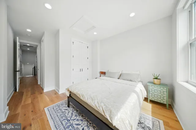 a bed room with a bed and a couch