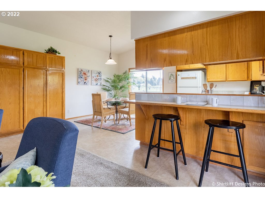 78566 Cedar Park Road Cottage Grove, OR 97424 - Photo 11 of 32 a dining room with furniture and a window