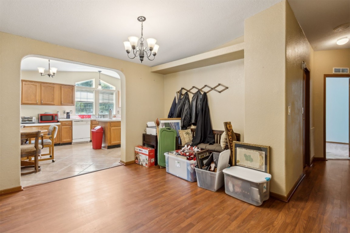 85135 Miner Road Yulee, FL 32097 - Photo 12 of 32 a living room with furniture and a wooden floor