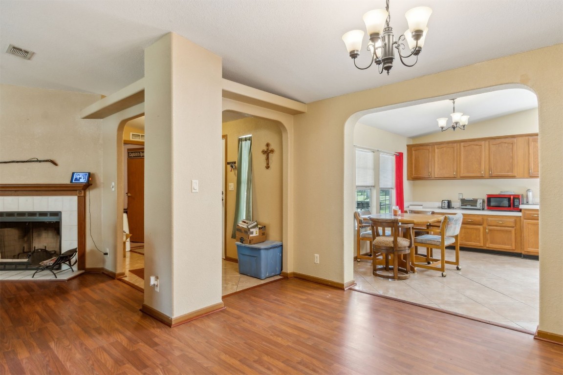 85135 Miner Road Yulee, FL 32097 - Photo 13 of 32 a view of a livingroom with furniture and a fireplace