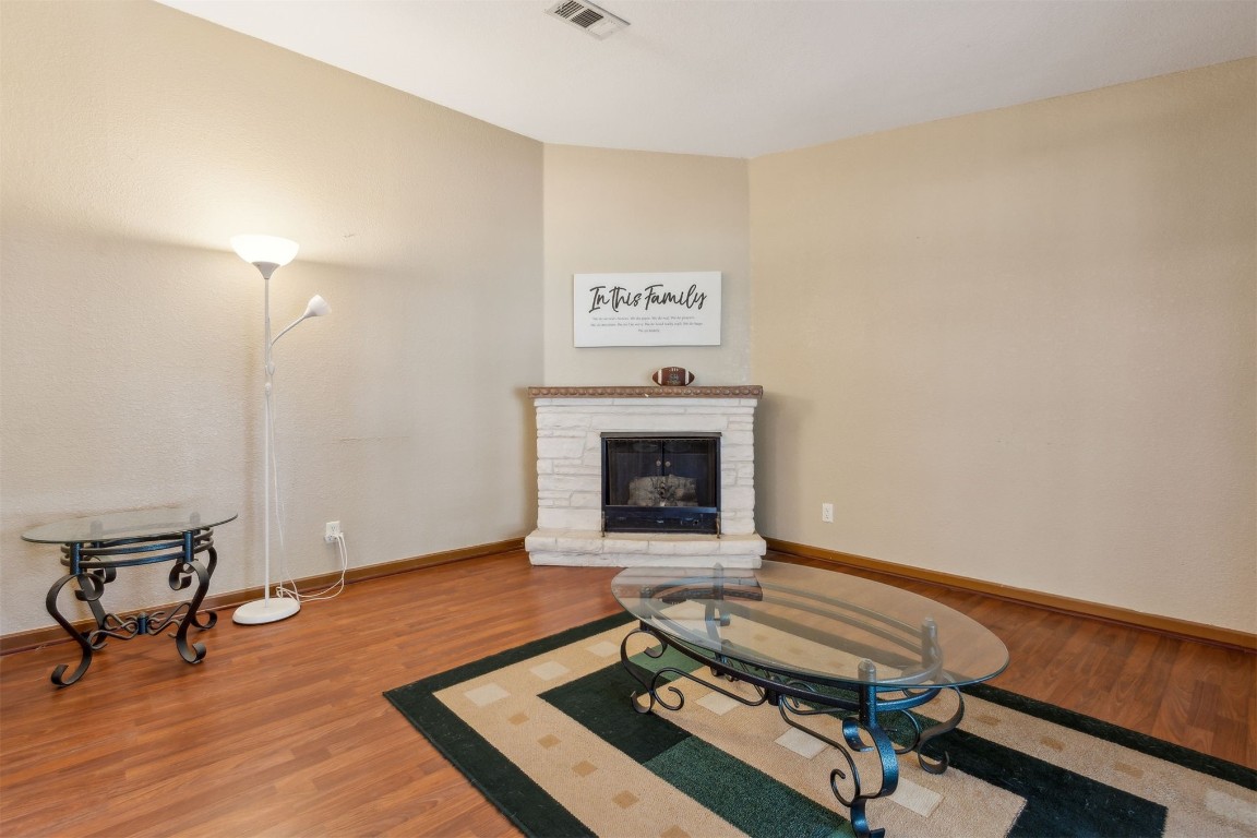 85135 Miner Road Yulee, FL 32097 - Photo 9 of 32 a living room with furniture and a fireplace