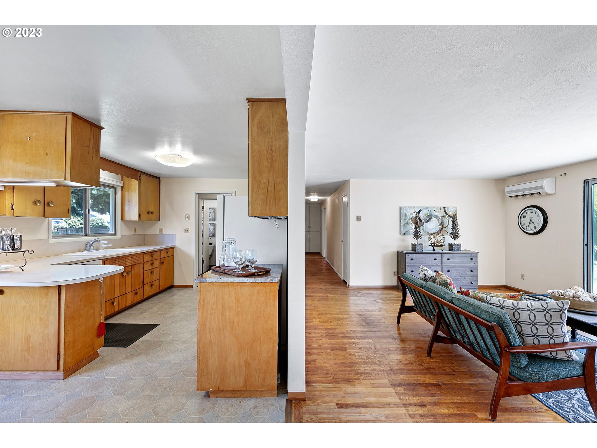2899 Wayside Loop Springfield, OR 97477 - Photo 11 of 31 a living room with furniture and a wooden floor