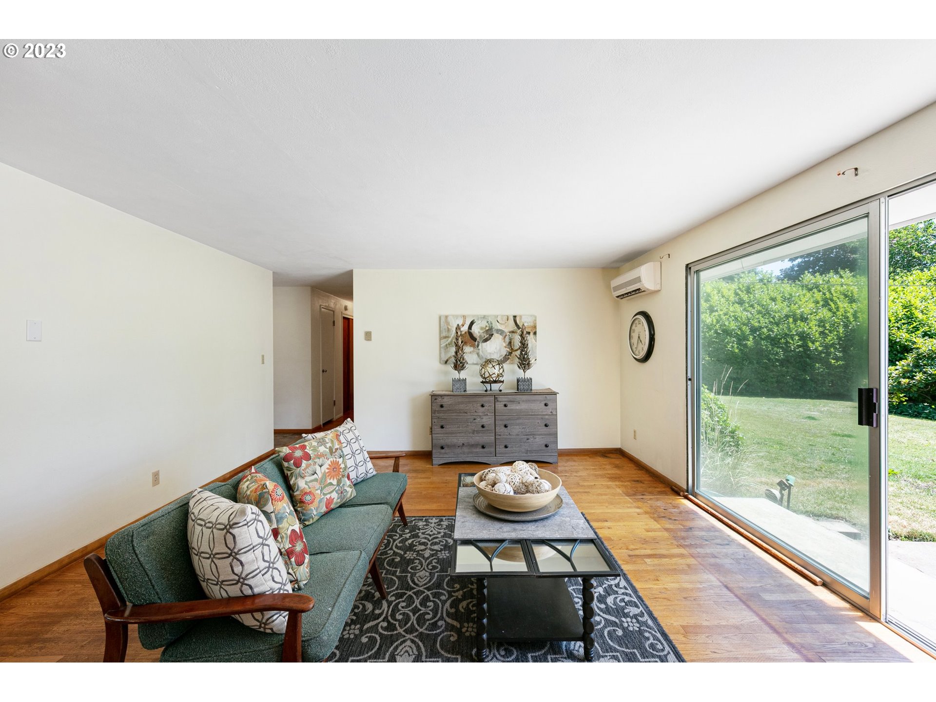 2899 Wayside Loop Springfield, OR 97477 - Photo 19 of 31 a living room with furniture and a floor to ceiling window