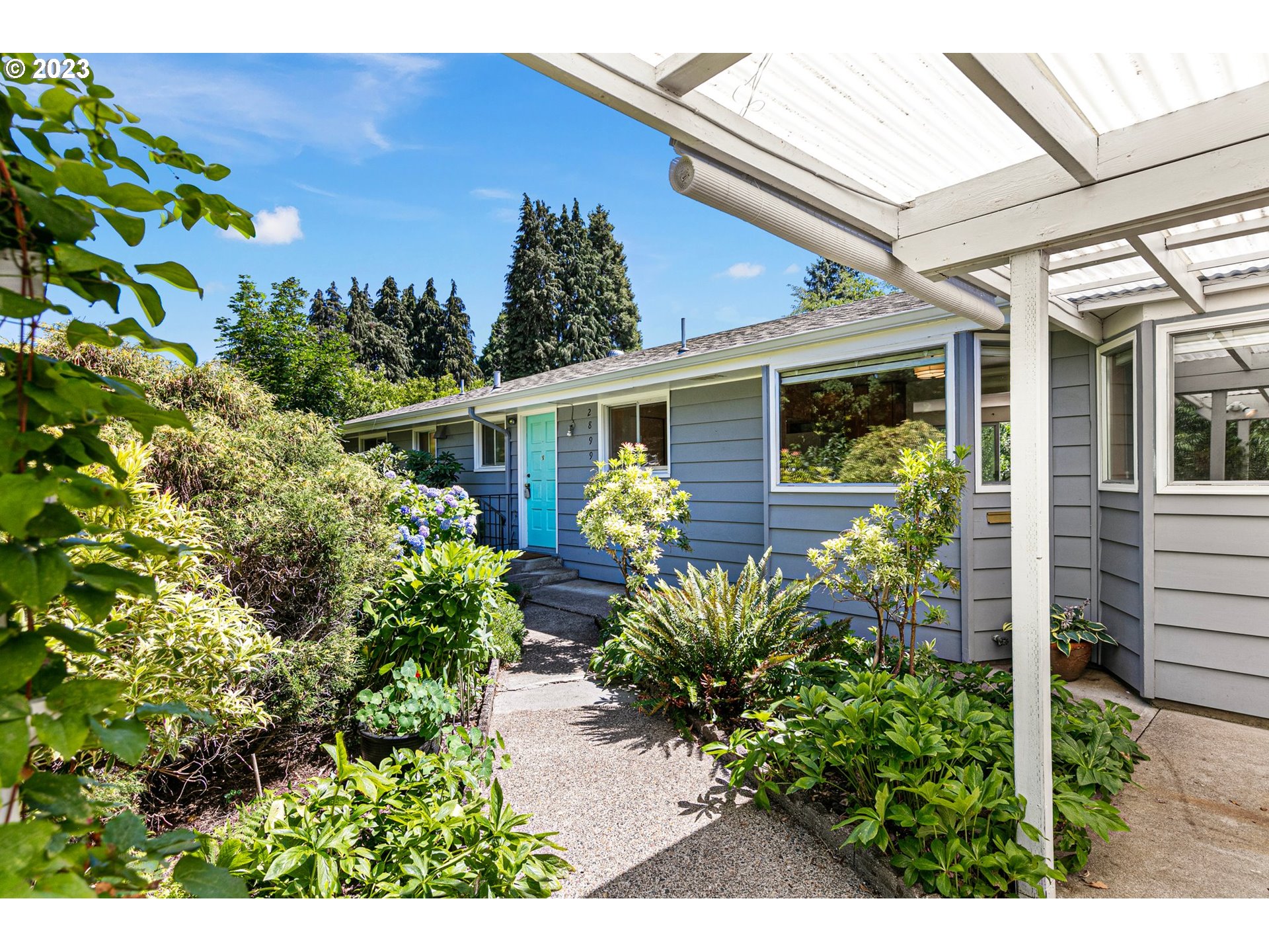 2899 Wayside Loop Springfield, OR 97477 - Photo 2 of 31 a view of a patio with table and chairs and potted plants