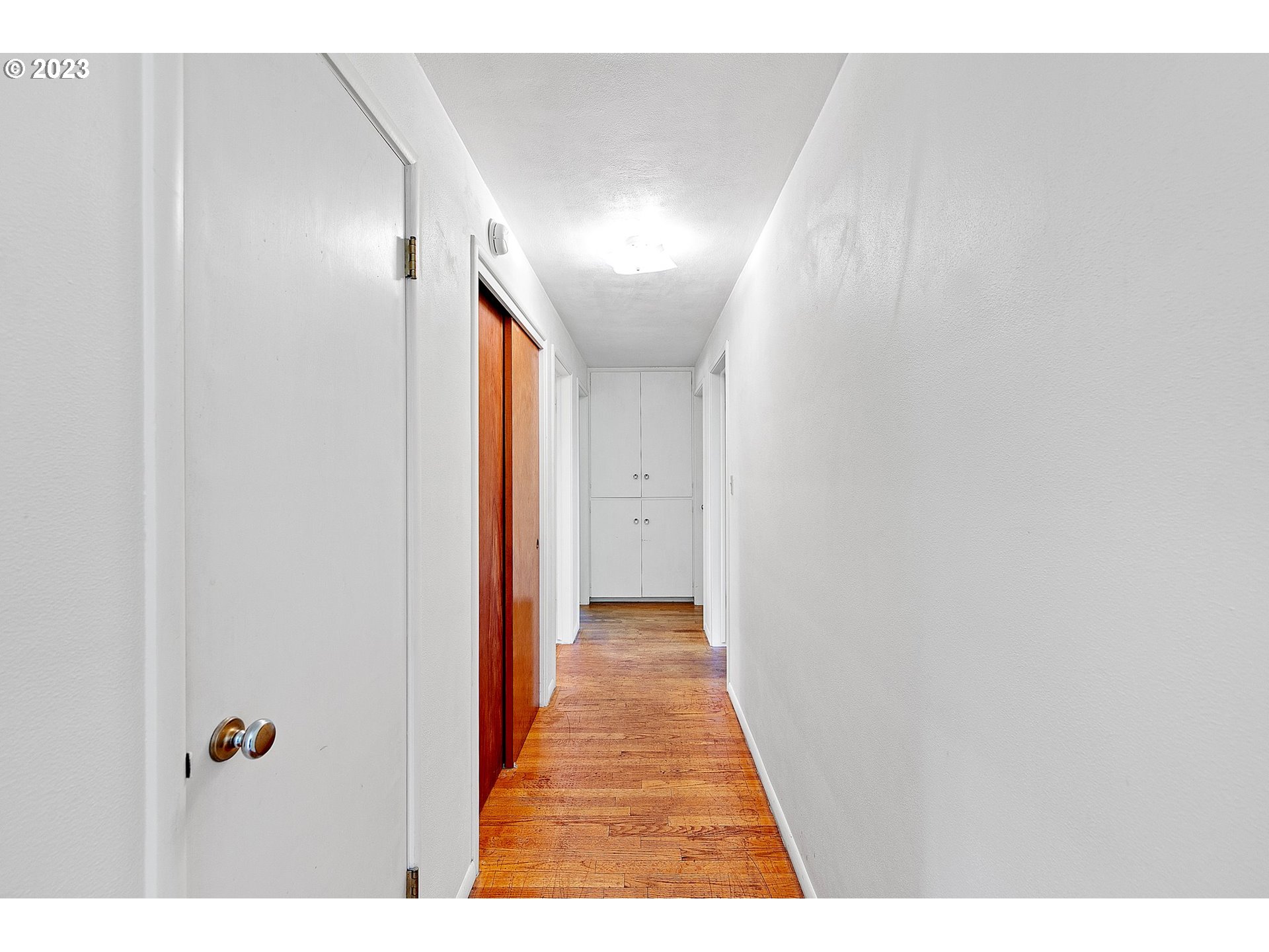 2899 Wayside Loop Springfield, OR 97477 - Photo 22 of 31 a view of a hallway with wooden floor
