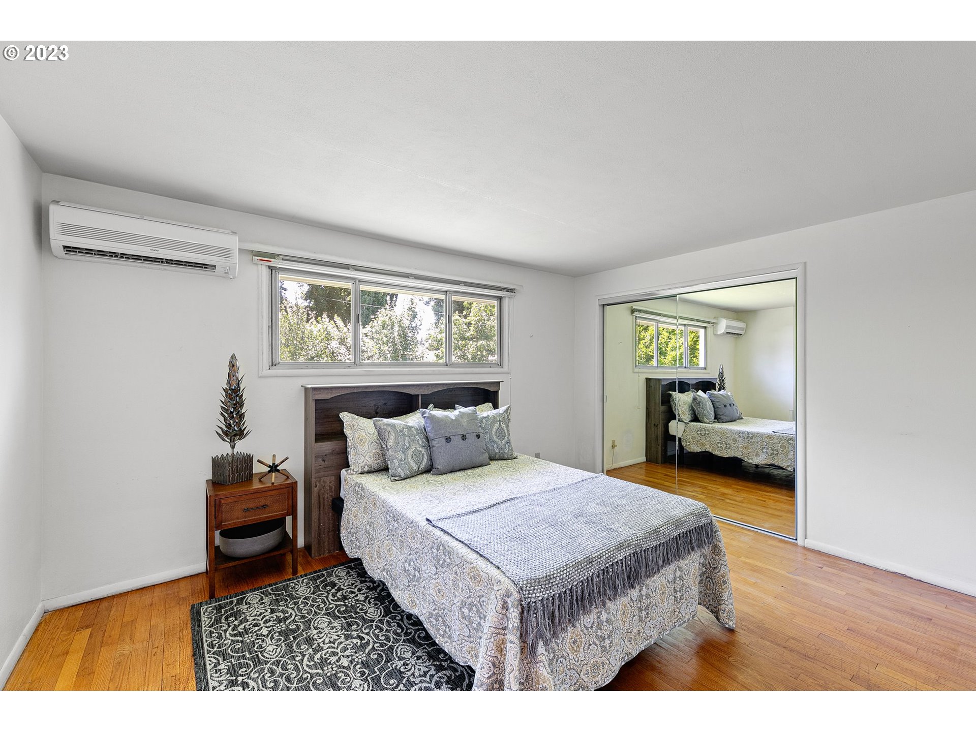 2899 Wayside Loop Springfield, OR 97477 - Photo 23 of 31 a bedroom with a large bed and a window