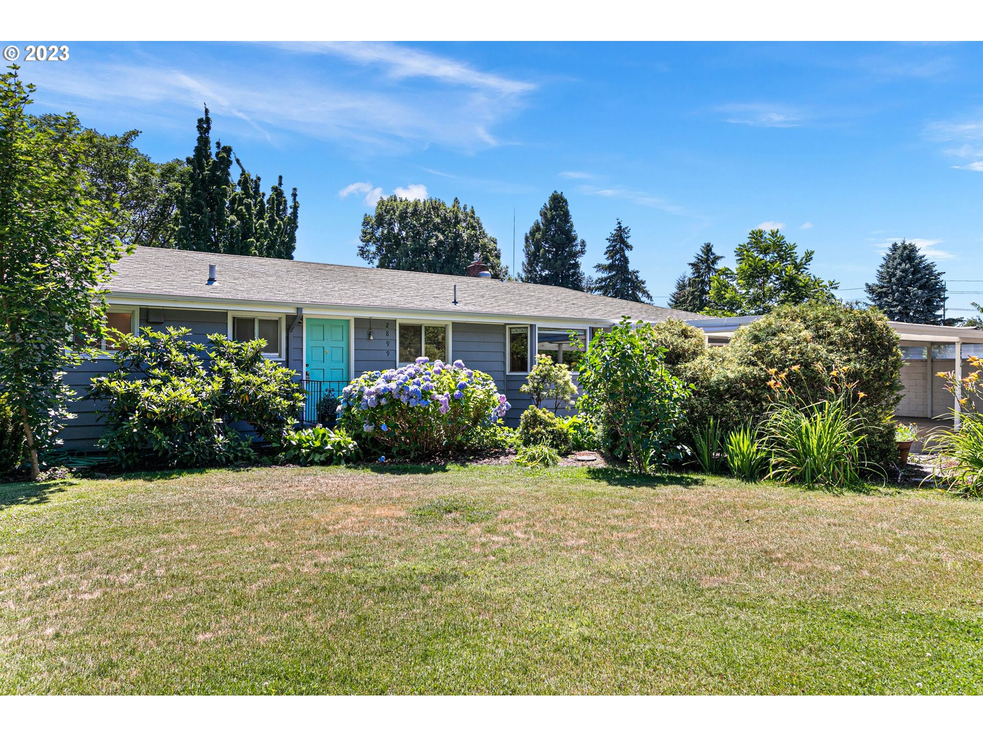 2899 Wayside Loop Springfield, OR 97477 - Photo 5 of 31 a view of an house with backyard space and garden