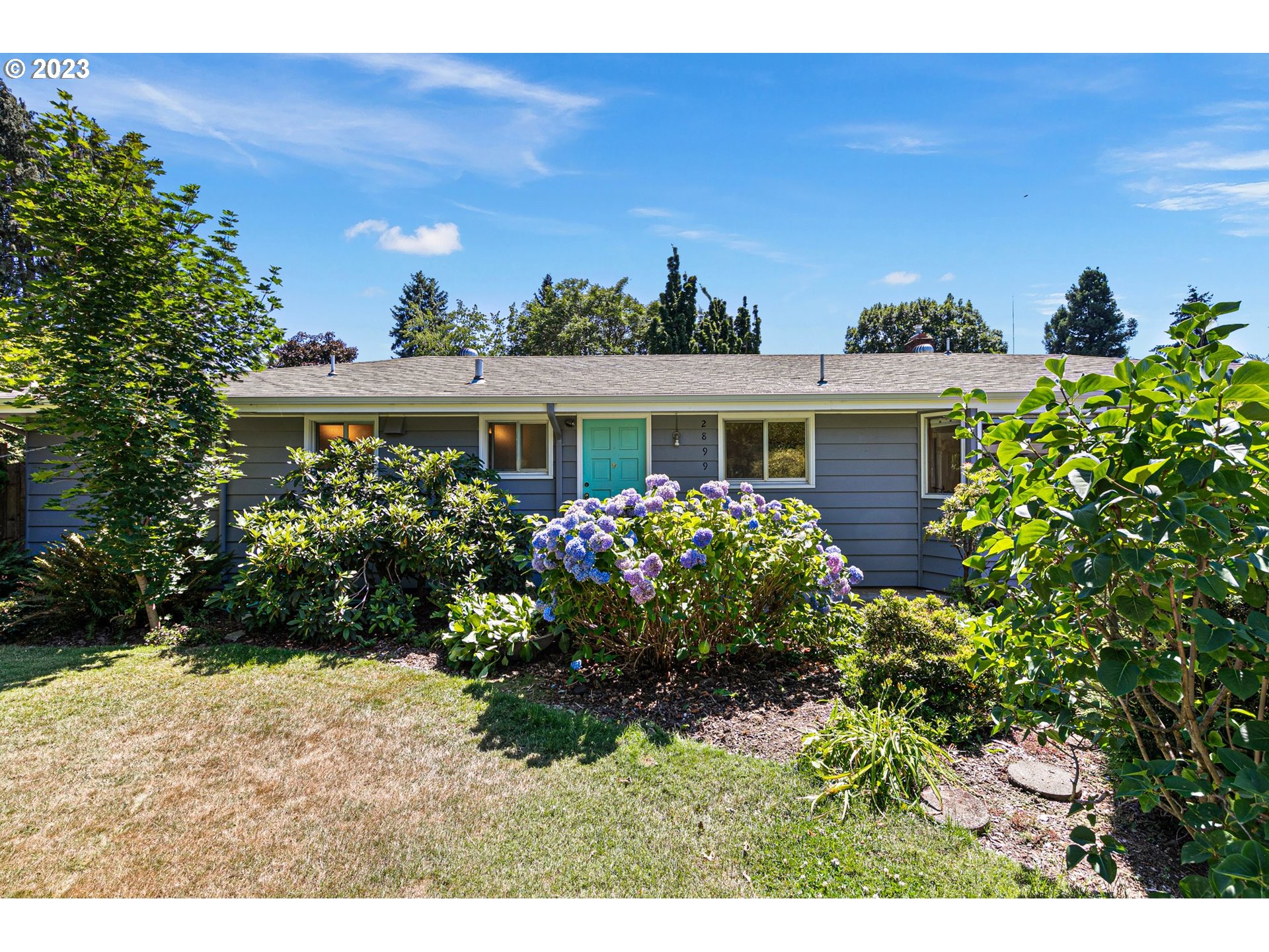 2899 Wayside Loop Springfield, OR 97477 - Photo 6 of 31 a view of a house with a garden