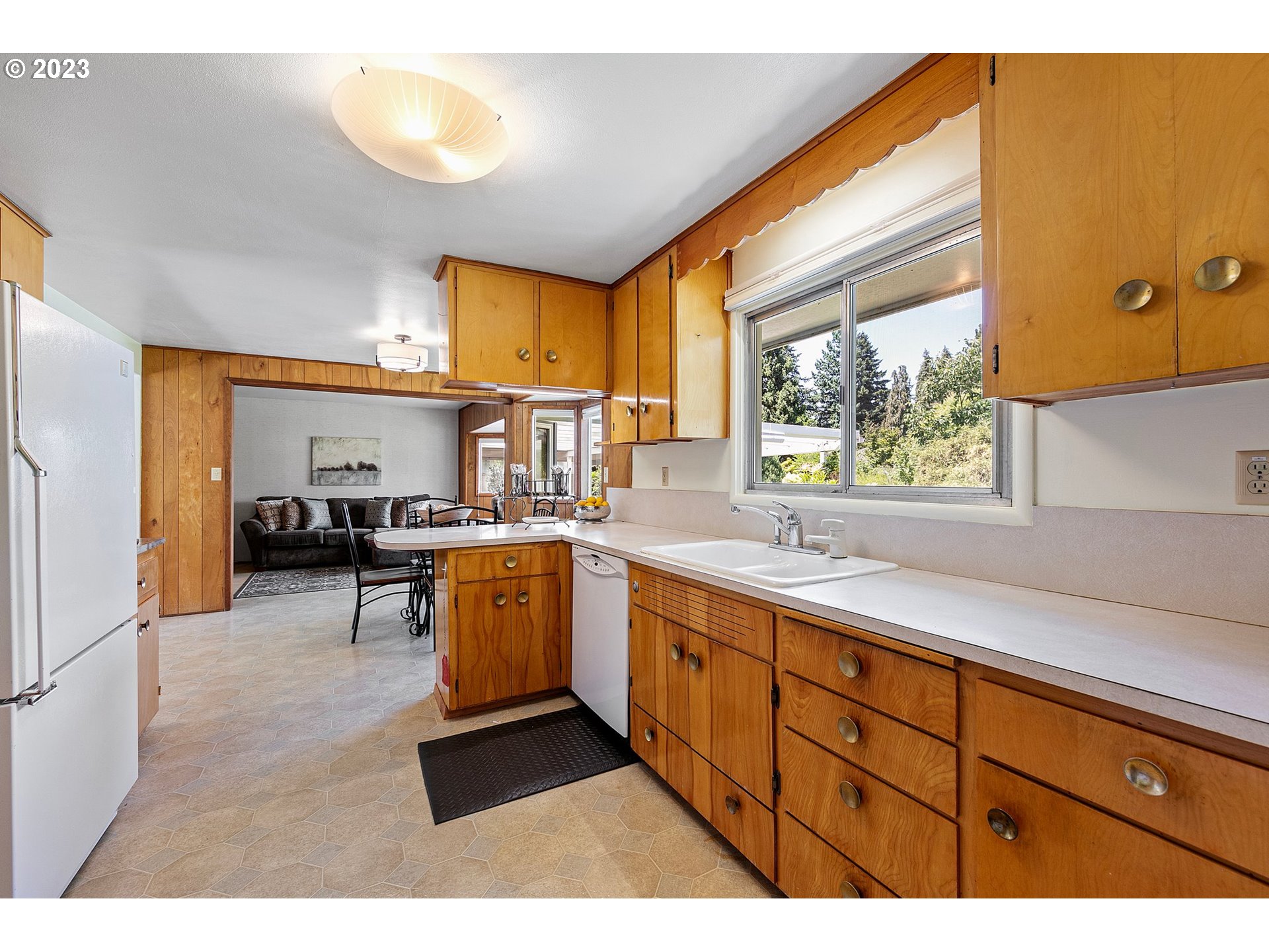 2899 Wayside Loop Springfield, OR 97477 - Photo 10 of 31 a kitchen with a sink stove and cabinets