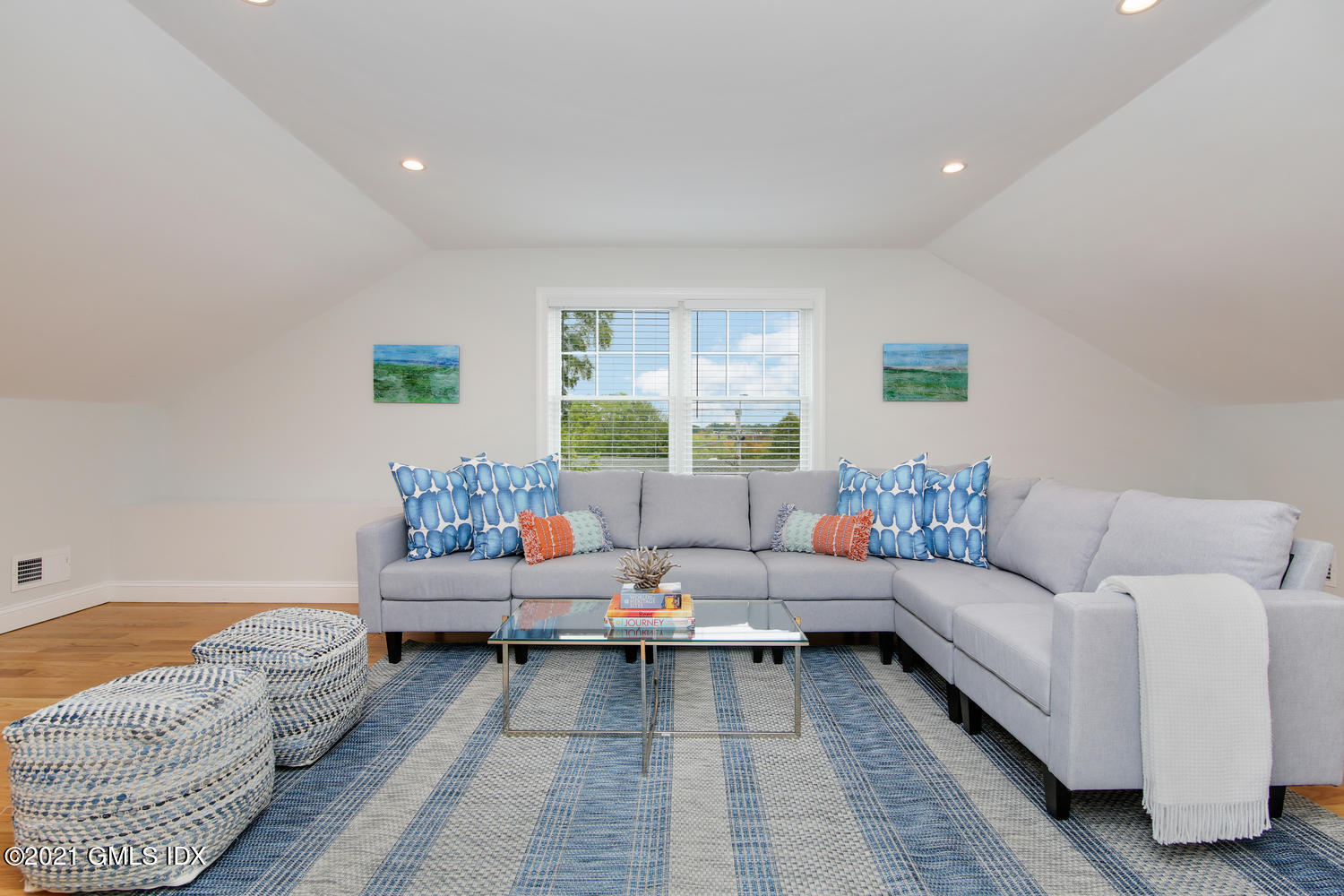 8 Sound Beach Ave Extension, Unit 3 Riverside, CT 06878 - Photo 21 of 29 a living room with furniture and a rug