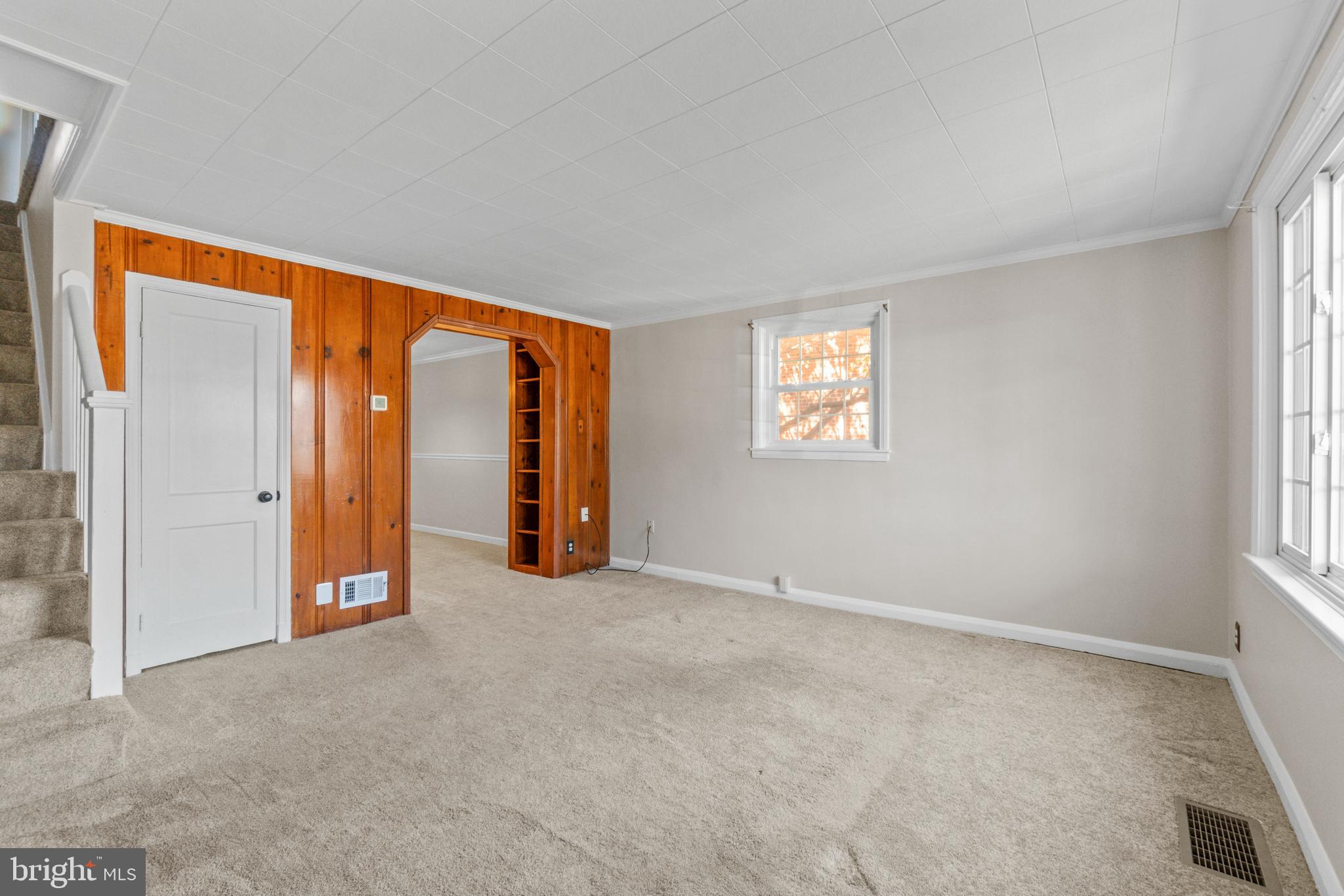 5514 Council Street Halethorpe, MD 21227 - Photo 12 of 36 an empty room with windows and closet