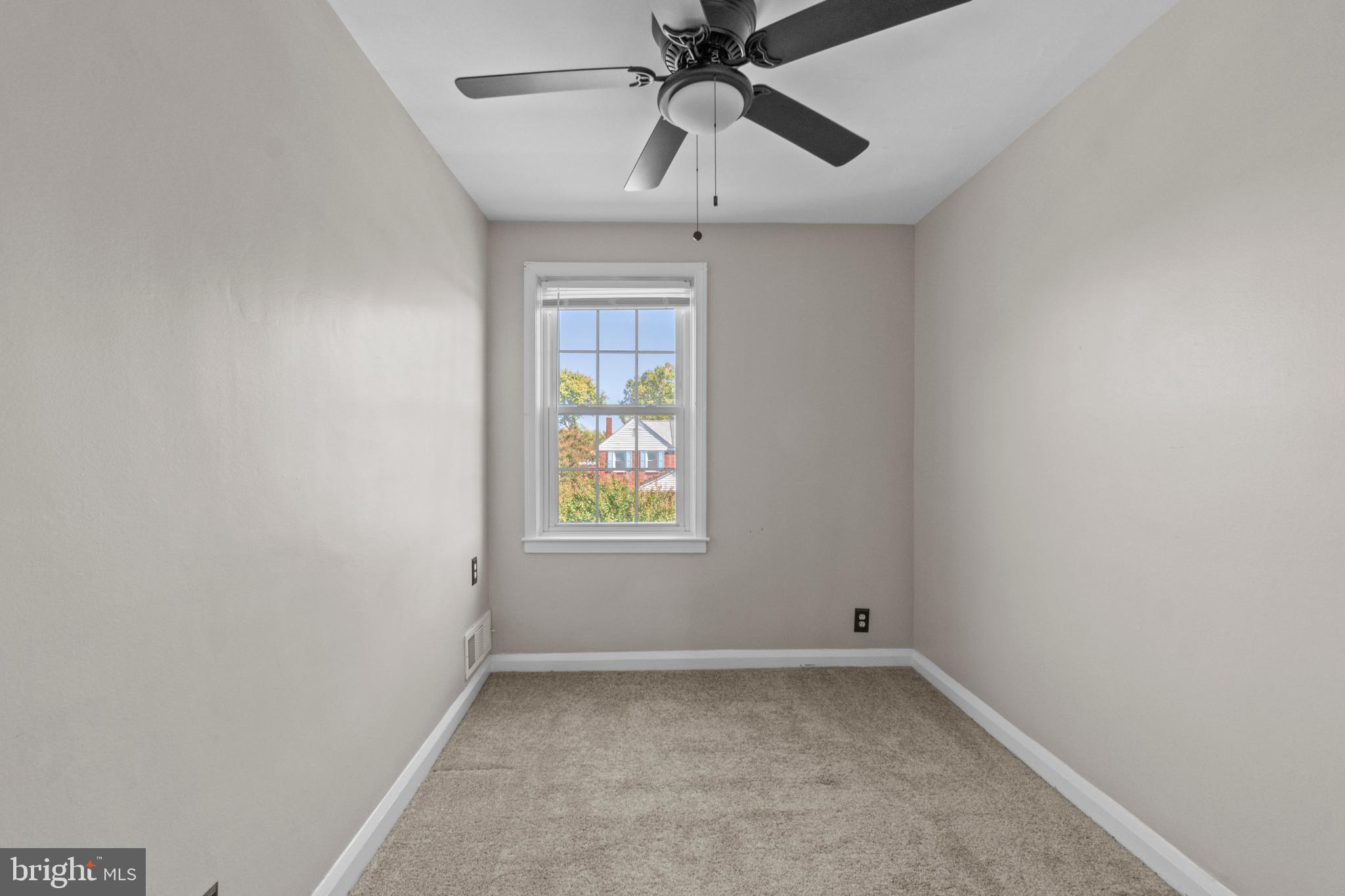 5514 Council Street Halethorpe, MD 21227 - Photo 18 of 36 a view of an empty room with a window