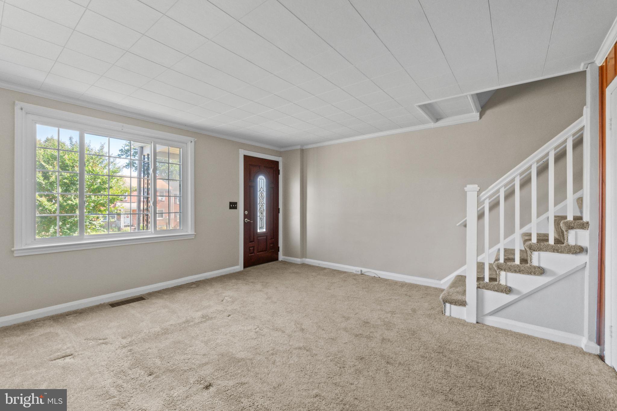 5514 Council Street Halethorpe, MD 21227 - Photo 3 of 36 a view of an empty room with windows
